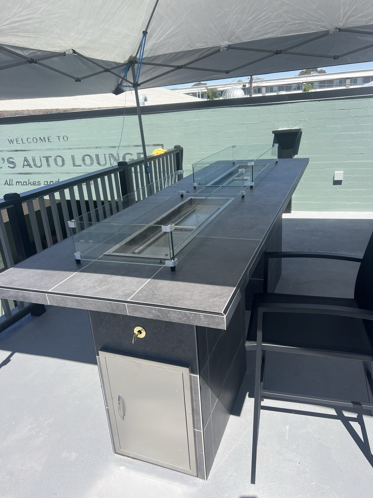 Outdoor cigar lounge with fire bar