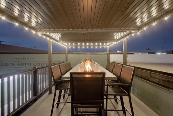 The patio under string lights — Gillie's Auto Lounge