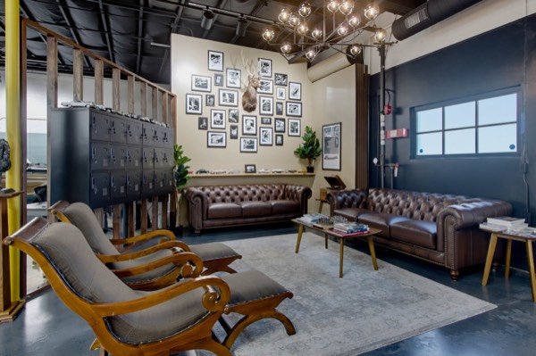 Lounge seating and the art wall — Gillie's Auto Lounge
