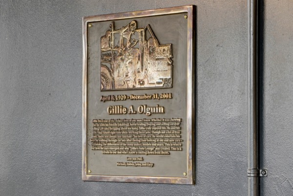 A plaque on the wall — Gillie's Auto Lounge