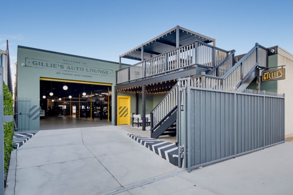 The building from the lot — Gillie's Auto Lounge